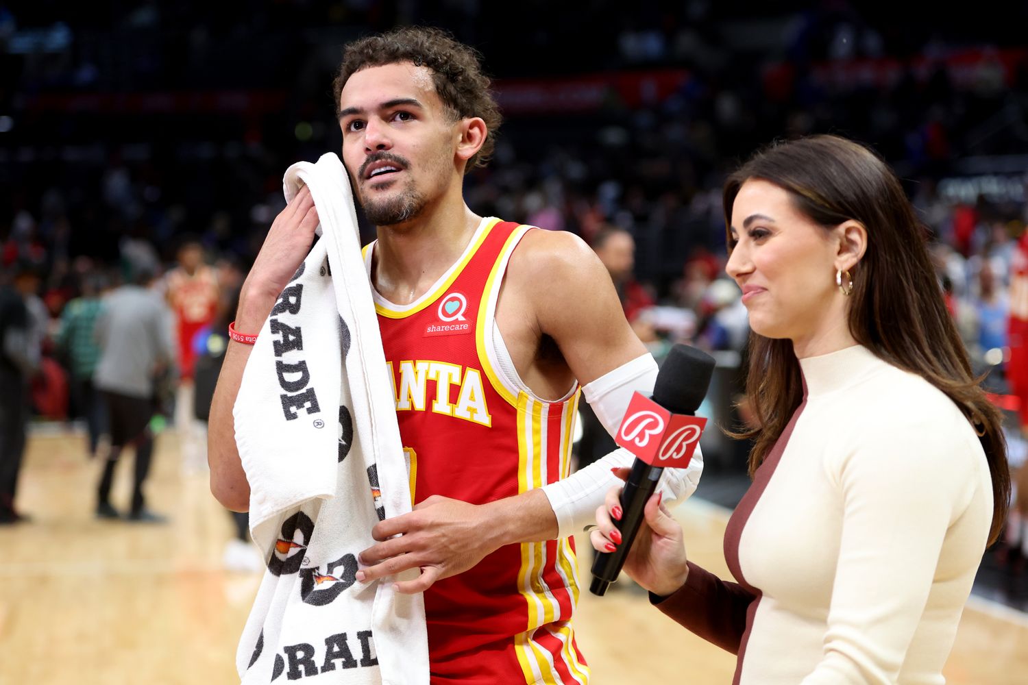 Trae Young smiles during a post-game interview.